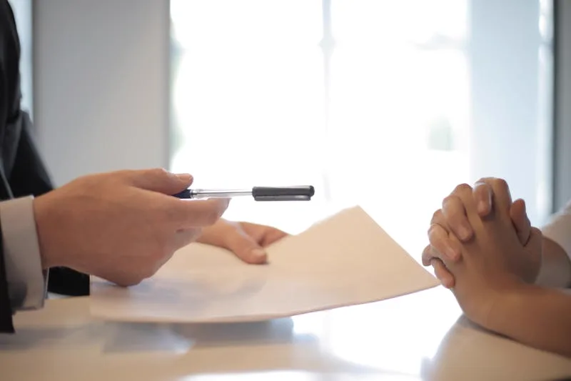 A housing counselor meeting with a client